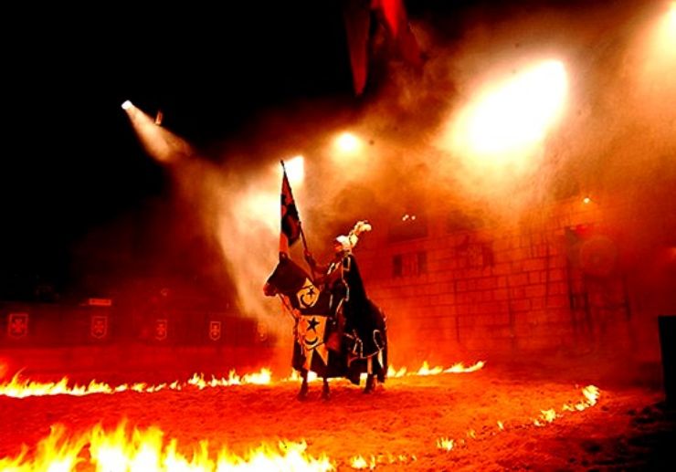Knight on horse surrounded by fire