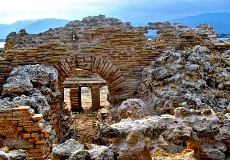 See the archeoligical sites of Nora in Sardinia