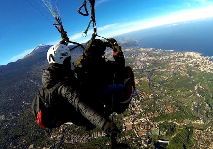 Enjoy Tenerife coastal view on a paraglide