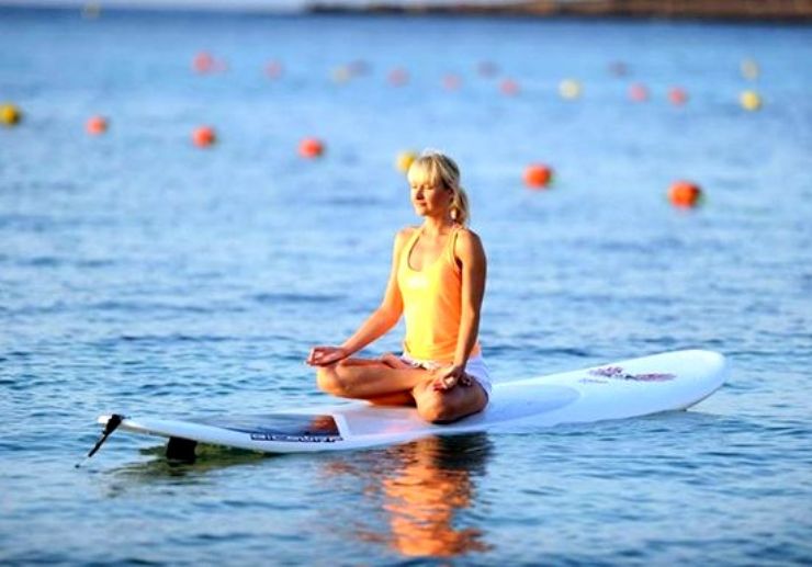 Stand up paddle yoga in Malta