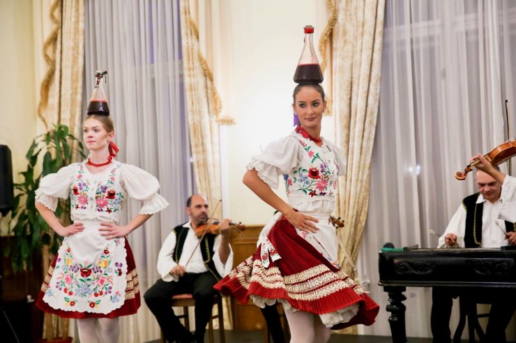 Hungarian folk dance with wine on head